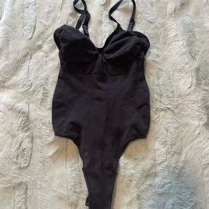 seamless sculpt thong bodysuit skims in onyx
